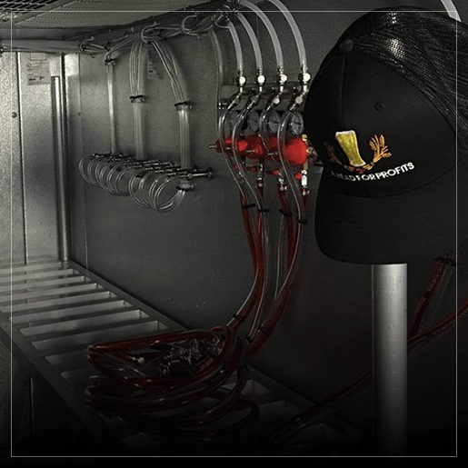A Head For Profits Hat Sitting On Newly Installed Beer Line Equipment